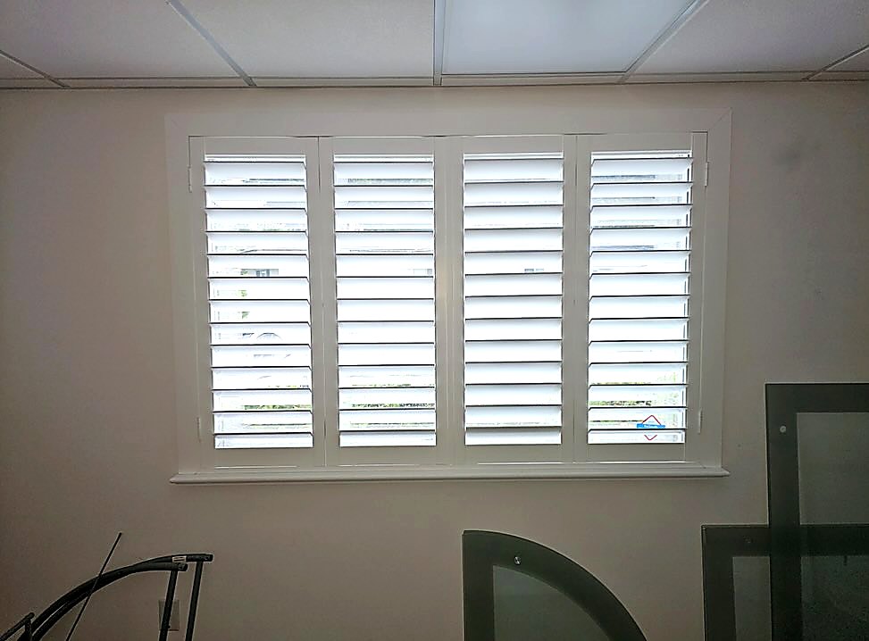Commercial office plantation shutters