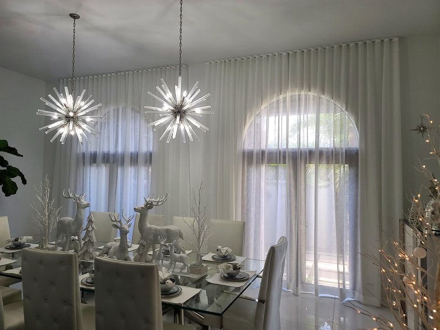 Sheer draperies dining room chandeliers