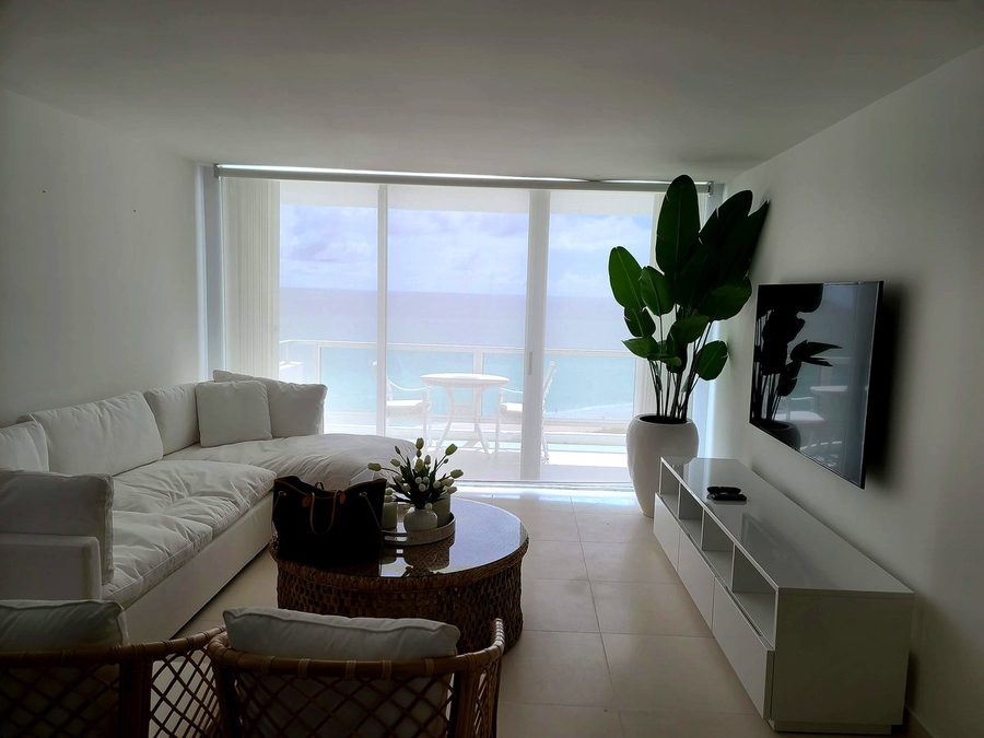 Roller shades oceanfront living room